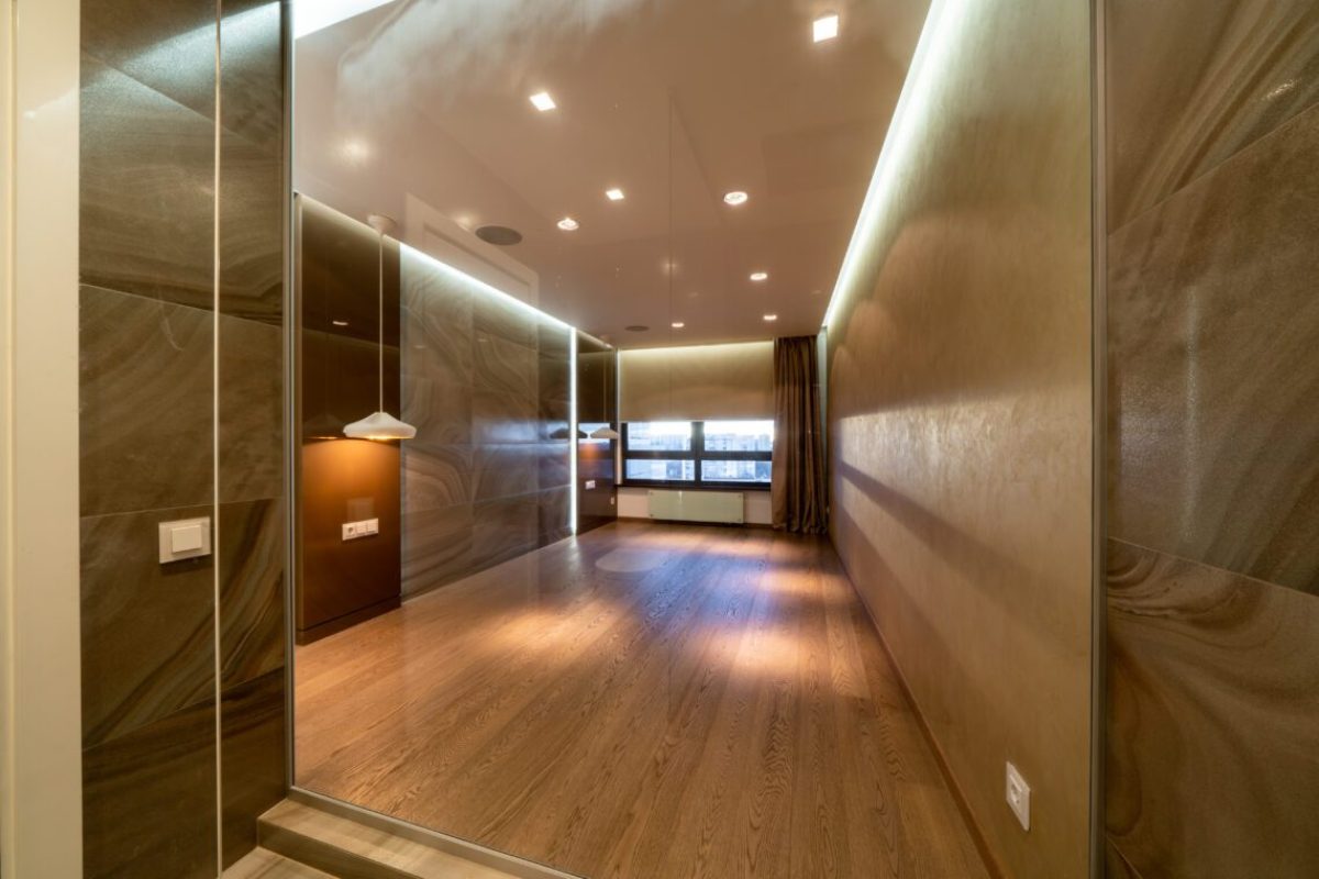 Bright, comfortable, modern wardrobe. Modern apartment interior with empty brown wardrobe. Repair concept