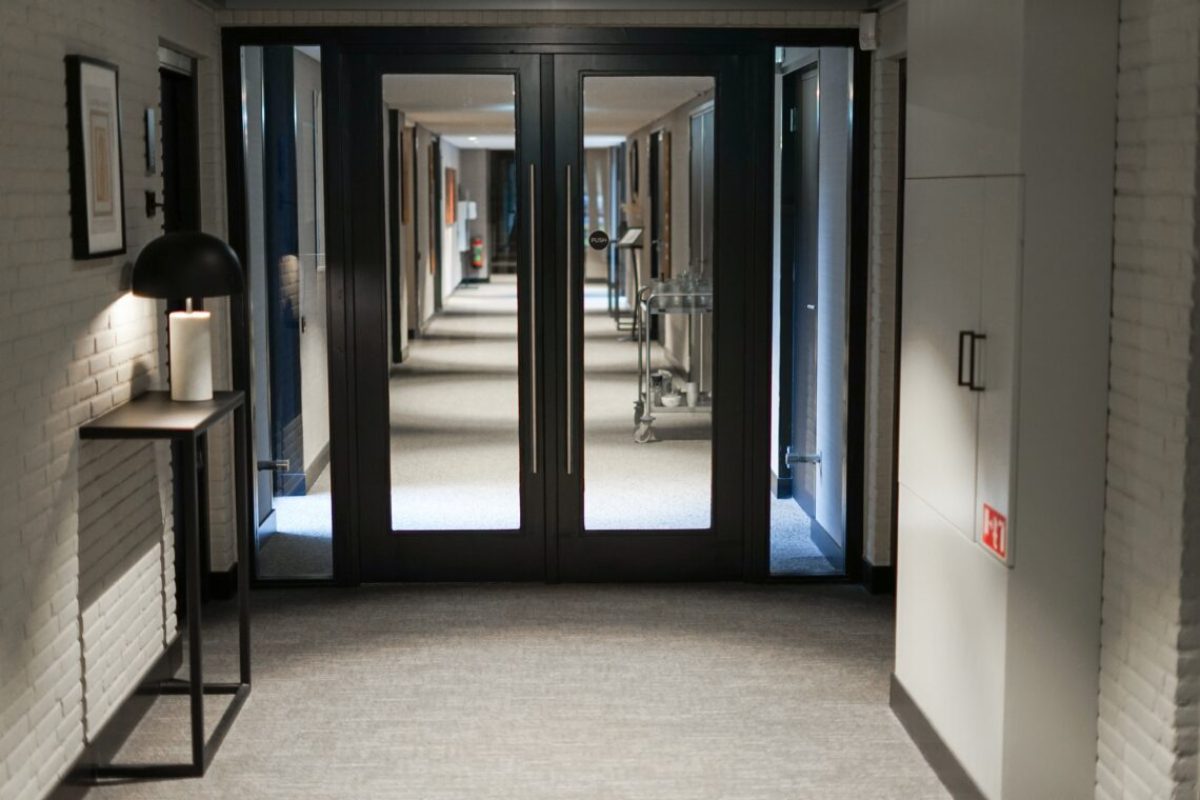 empty-hallway-in-hotel-2023-11-27-05-06-25-utc