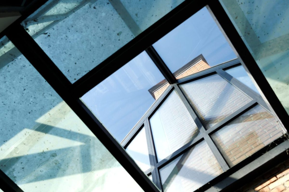 glass roof over the future greenhouse. Major renovation of an house