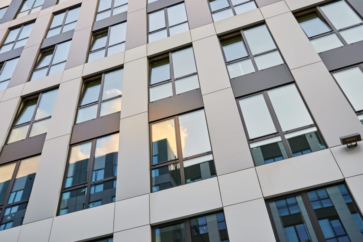 Facade of office building. Windows pattern on the residential building. Modern architecture style