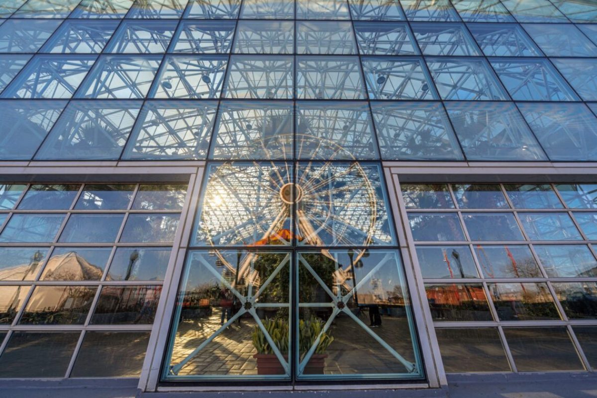 Navy pier ferris wheel reflection with windows glasses at the sunset time,Illinois, United States, USA